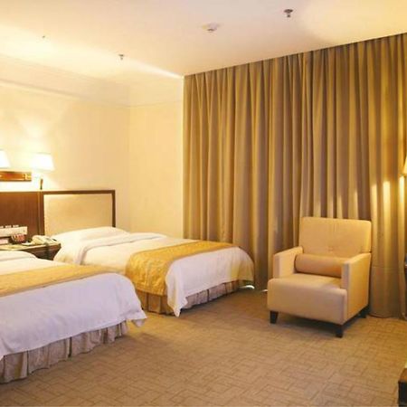 Wanxing Hotel Chao Yang Square Branch Нанинг Екстериор снимка