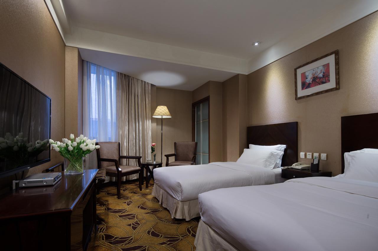 Wanxing Hotel Chao Yang Square Branch Нанинг Екстериор снимка